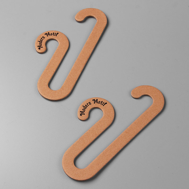 Cardboard hanger A sustainable clothes hanging solution